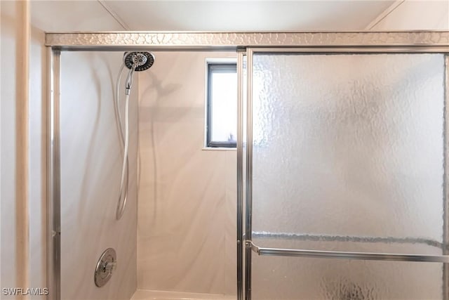 2127 SW Pine Ln Unit 3, Cape Coral, FL 33991 - bathroom featuring an enclosed shower