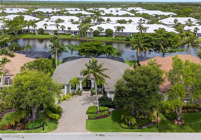 7637 Mulberry Ln, Naples, FL 34114 - aerial perspective of suburban area with a large body of water
