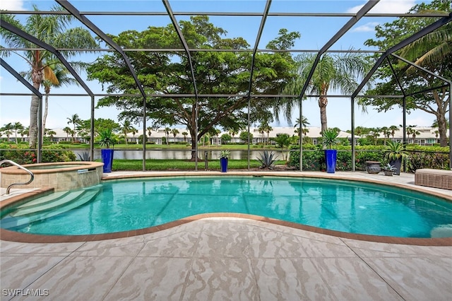 7637 Mulberry Ln, Naples, FL 34114 - view of pool with a patio area, a water view, glass enclosure, and a pool with connected hot tub