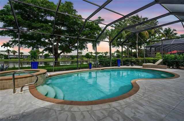 7637 Mulberry Ln, Naples, FL 34114 - pool at dusk with a pool with connected hot tub, a water view, a patio, and a lanai