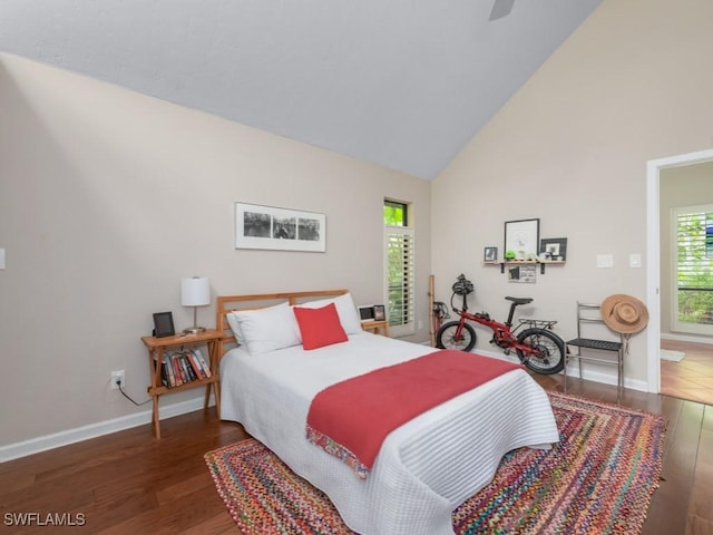 1271 Solana Rd Unit E4, Naples, FL 34103 - bedroom featuring wood finished floors, high vaulted ceiling, and a ceiling fan