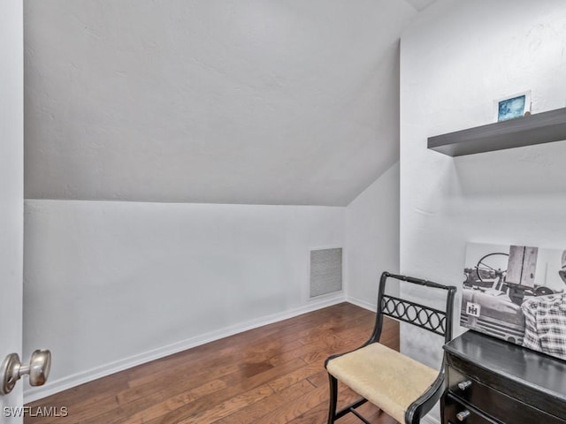 1271 Solana Rd Unit E4, Naples, FL 34103 - home office featuring vaulted ceiling and hardwood / wood-style flooring