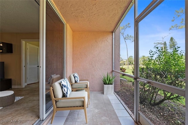 170 Turtle Lake Ct Unit 109, Naples, FL 34105 - sunroom with healthy amount of natural light