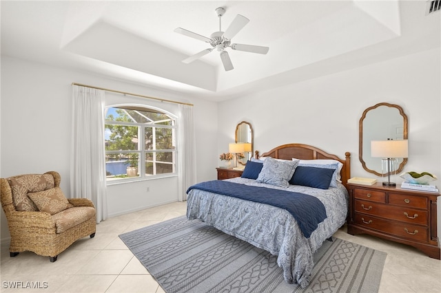3615 Tripoli Blvd, Punta Gorda, FL 33950 - bedroom with a raised ceiling, light tile patterned floors, and ceiling fan