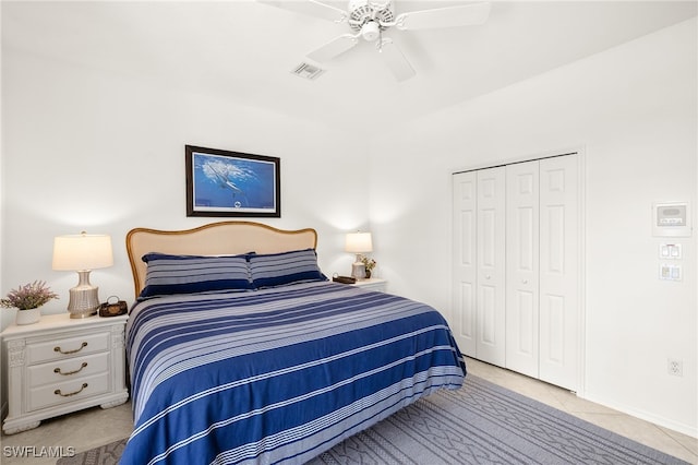 3615 Tripoli Blvd, Punta Gorda, FL 33950 - bedroom with a closet, a ceiling fan, and light tile patterned floors