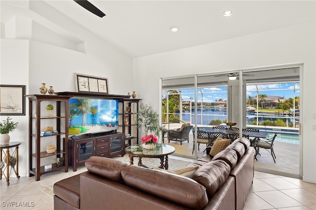 3615 Tripoli Blvd, Punta Gorda, FL 33950 - living room with ceiling fan, light tile patterned floors, vaulted ceiling, and recessed lighting