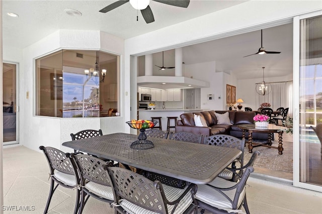3615 Tripoli Blvd, Punta Gorda, FL 33950 - dining area featuring ceiling fan and a chandelier