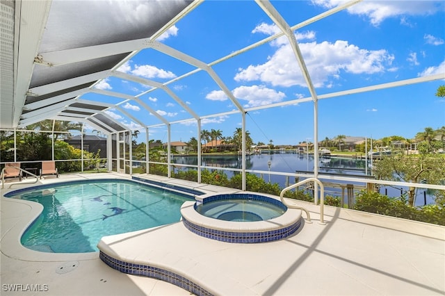 3615 Tripoli Blvd, Punta Gorda, FL 33950 - view of swimming pool featuring a water view, a patio, glass enclosure, and a pool with connected hot tub