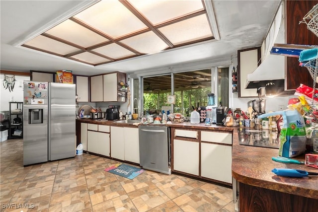 17041 Tarpon Way N, Fort Myers, FL 33917 - kitchen with stainless steel appliances and stone finish flooring