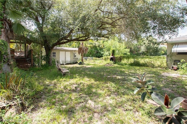17041 Tarpon Way N, Fort Myers, FL 33917 - view of yard featuring a shed