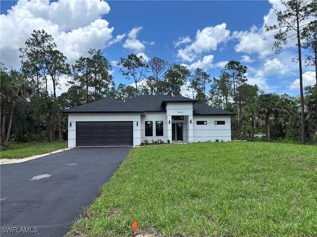 4259 12th Ave SE, Naples, FL 34117 - view of front of house featuring asphalt driveway, a garage, stucco siding, and a front lawn