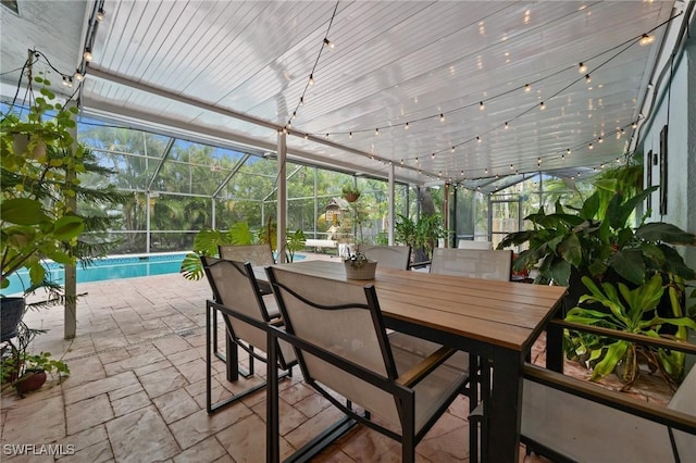770 Wilson Ave, Fort Myers, FL 33919 - sunroom / solarium featuring outdoor dining area