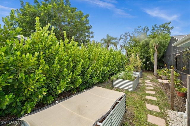 770 Wilson Ave, Fort Myers, FL 33919 - view of yard featuring a garden