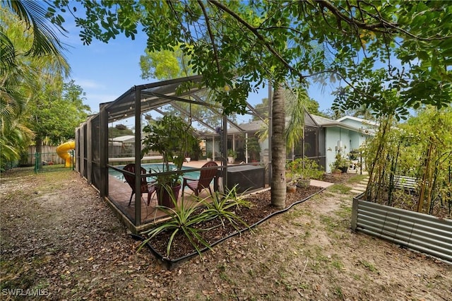 770 Wilson Ave, Fort Myers, FL 33919 - fenced backyard featuring a lanai