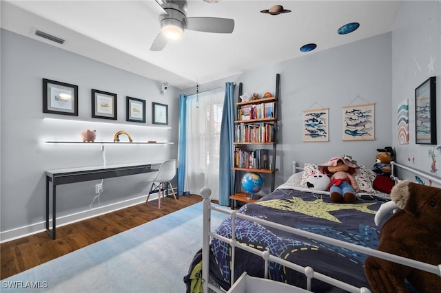 770 Wilson Ave, Fort Myers, FL 33919 - bedroom featuring wood finished floors and ceiling fan