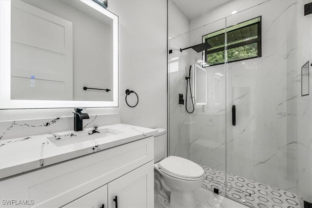 1220 Edward Ave, Lehigh Acres, FL 33972 - bathroom featuring a marble finish shower, vanity, and marble finish flooring