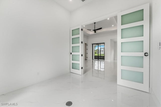 1220 Edward Ave, Lehigh Acres, FL 33972 - unfurnished room featuring marble tiled flooring and ceiling fan