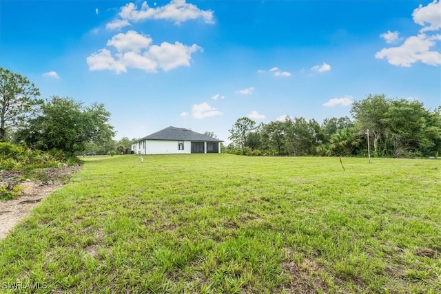 1220 Edward Ave, Lehigh Acres, FL 33972 - view of grassy yard