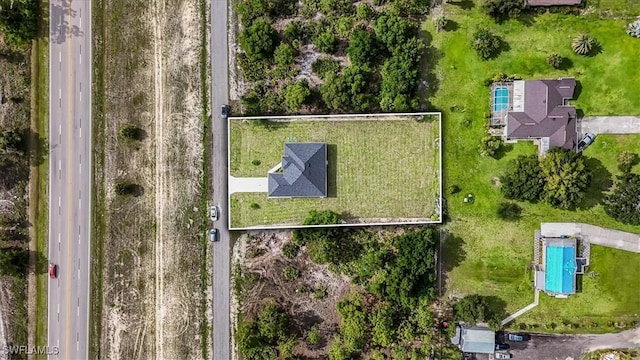 1220 Edward Ave, Lehigh Acres, FL 33972 - aerial view of a pool area