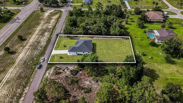 1220 Edward Ave, Lehigh Acres, FL 33972 - aerial overview of property's location featuring property parcel outlined
