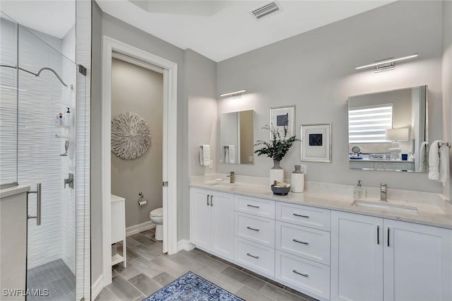 14384 Tuscany Pointe Cv, Naples, FL 34120 - bathroom with double vanity and a shower stall