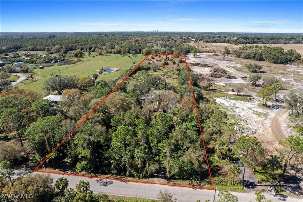 5300 Higginbotham Rd, Fort Myers, FL 33905 - aerial view of sparsely populated area featuring property parcel outlined