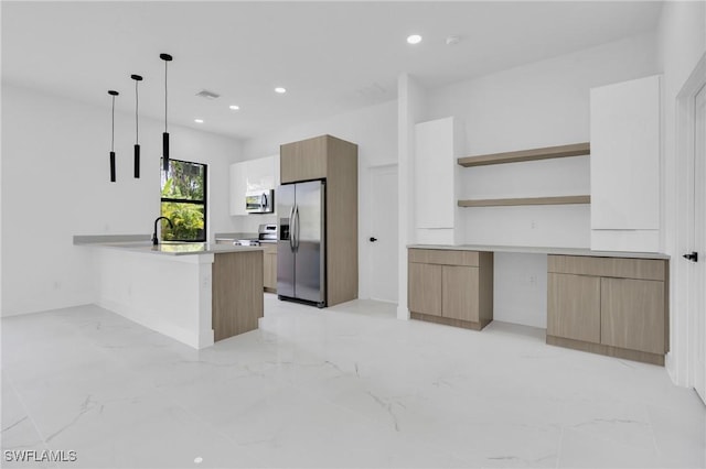 3202 21st St W, Lehigh Acres, FL 33971 - kitchen with appliances with stainless steel finishes, modern cabinets, a peninsula, open shelves, and light marble finish floors