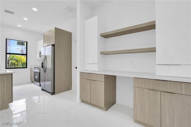 3202 21st St W, Lehigh Acres, FL 33971 - kitchen featuring stainless steel fridge, modern cabinets, light countertops, open shelves, and recessed lighting