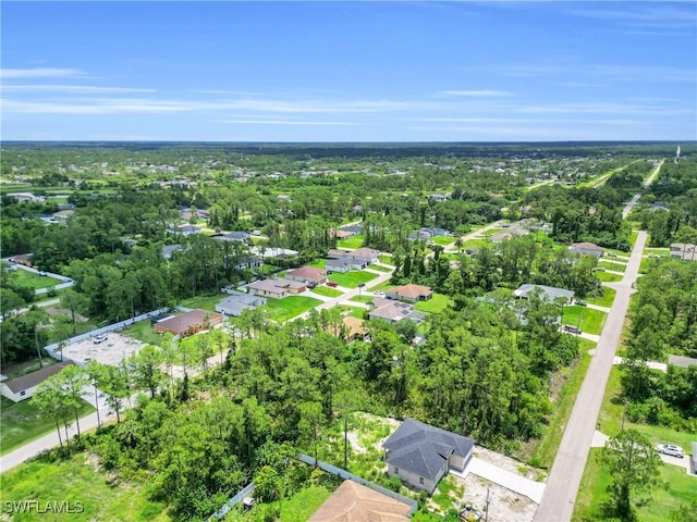 3202 21st St W, Lehigh Acres, FL 33971 - aerial view of property and surrounding area featuring nearby suburban area