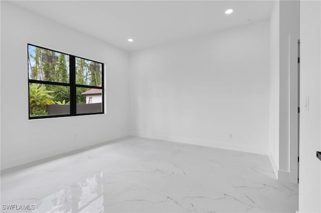 3202 21st St W, Lehigh Acres, FL 33971 - spare room with recessed lighting and marble tiled flooring