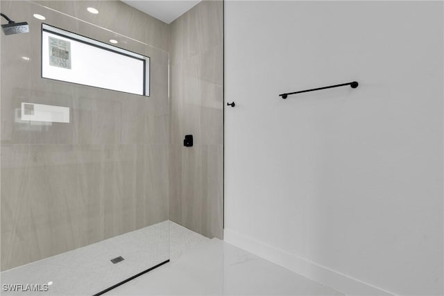 3202 21st St W, Lehigh Acres, FL 33971 - full bath featuring a tile shower and baseboards