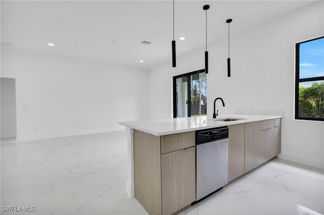 3202 21st St W, Lehigh Acres, FL 33971 - kitchen with stainless steel dishwasher, modern cabinets, light marble finish flooring, recessed lighting, and light countertops