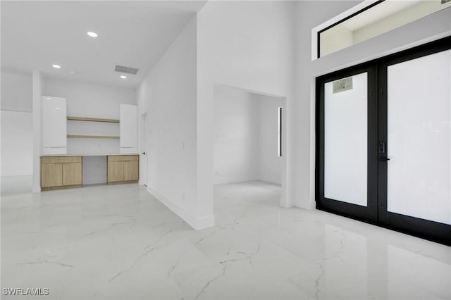 3202 21st St W, Lehigh Acres, FL 33971 - foyer entrance featuring light marble finish flooring, french doors, and recessed lighting