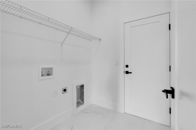 3202 21st St W, Lehigh Acres, FL 33971 - laundry room featuring hookup for an electric dryer, washer hookup, and light marble finish floors