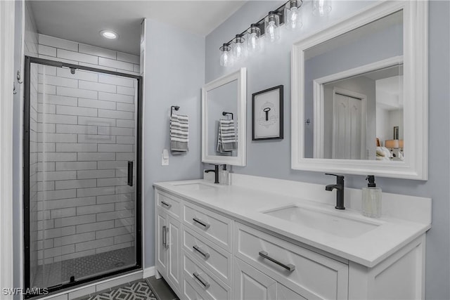 3760 Sawgrass Way Unit 3514, Naples, FL 34112 - bathroom with a stall shower, double vanity, and recessed lighting