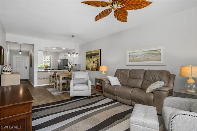3760 Sawgrass Way Unit 3514, Naples, FL 34112 - living area featuring a ceiling fan and dark wood-type flooring