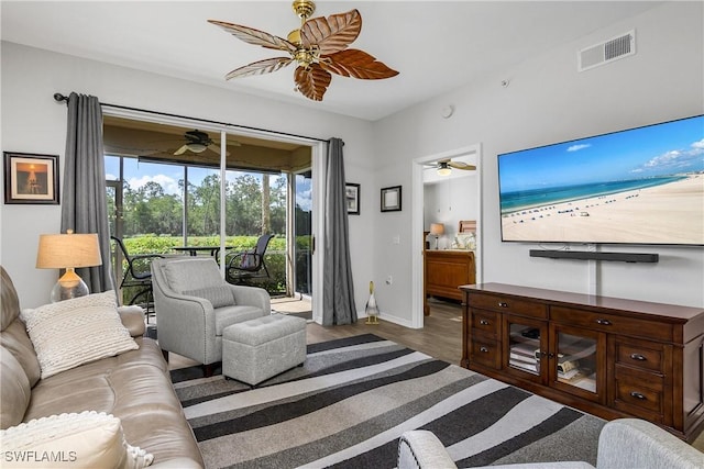 3760 Sawgrass Way Unit 3514, Naples, FL 34112 - living area featuring ceiling fan and wood finished floors