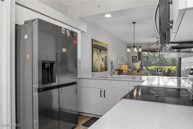 3760 Sawgrass Way Unit 3514, Naples, FL 34112 - kitchen with stainless steel fridge with ice dispenser, electric range, white cabinets, pendant lighting, and recessed lighting