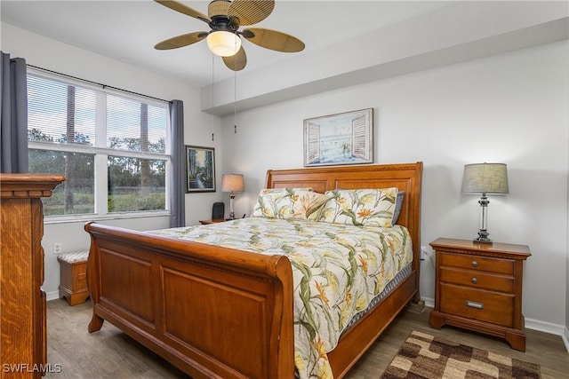 3760 Sawgrass Way Unit 3514, Naples, FL 34112 - bedroom featuring wood finished floors and ceiling fan