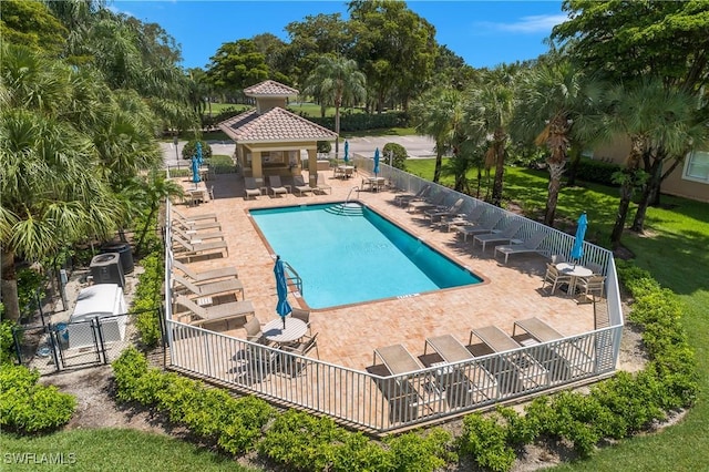 3760 Sawgrass Way Unit 3514, Naples, FL 34112 - community pool featuring a gazebo, a patio, and view of wooded area