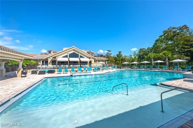 3760 Sawgrass Way Unit 3514, Naples, FL 34112 - community pool with a patio