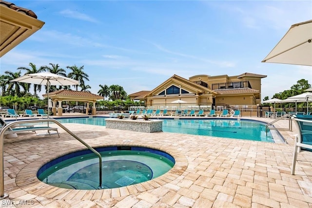 3760 Sawgrass Way Unit 3514, Naples, FL 34112 - community pool with a community hot tub, a gazebo, and a patio area
