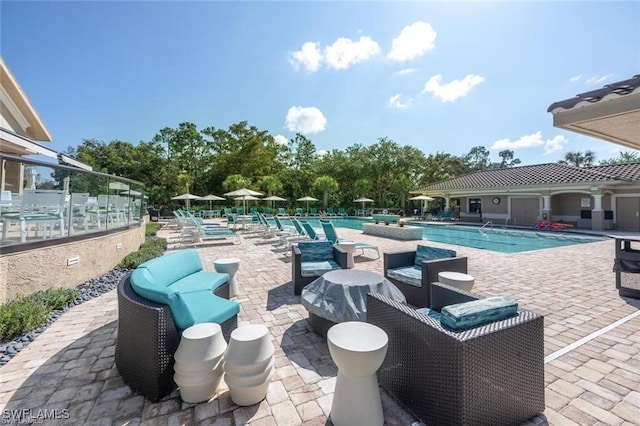 3760 Sawgrass Way Unit 3514, Naples, FL 34112 - community pool featuring a patio