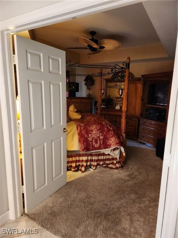 1240 Shady Rest Ln Unit 104, Naples, FL 34103 - bedroom featuring carpet flooring