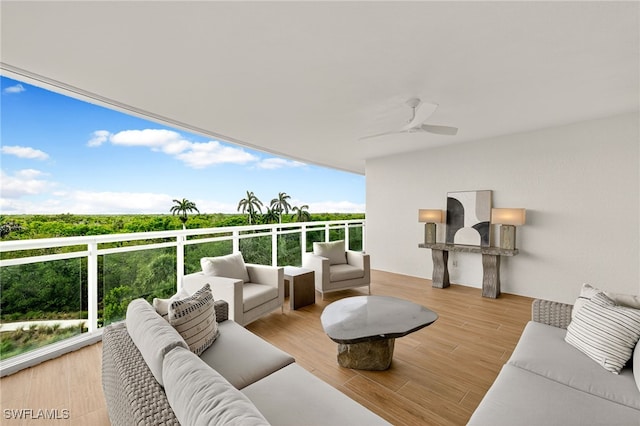 13925 Old Coast Rd Unit 403, Naples, FL 34110 - balcony with an outdoor living space and a ceiling fan