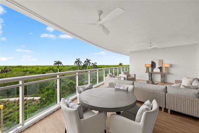13925 Old Coast Rd Unit 403, Naples, FL 34110 - balcony featuring an outdoor living space and ceiling fan