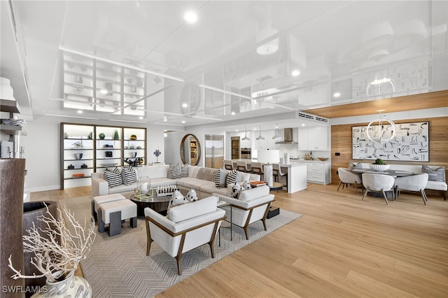 13925 Old Coast Rd Unit 403, Naples, FL 34110 - living area with light wood-style floors and recessed lighting
