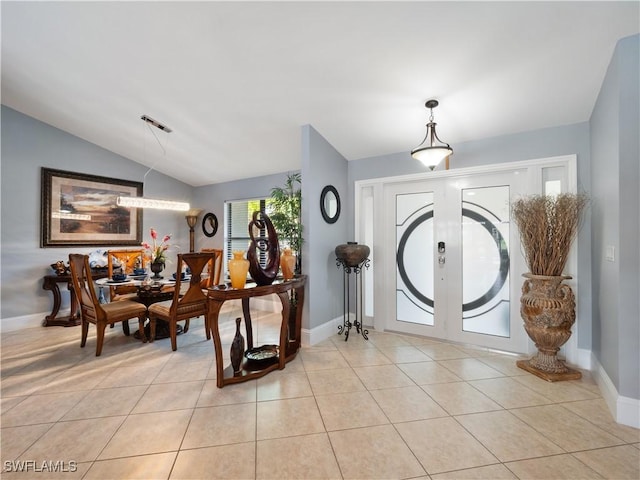 1431 SW 53rd Ln, Cape Coral, FL 33914 - foyer entrance with light tile patterned floors and lofted ceiling