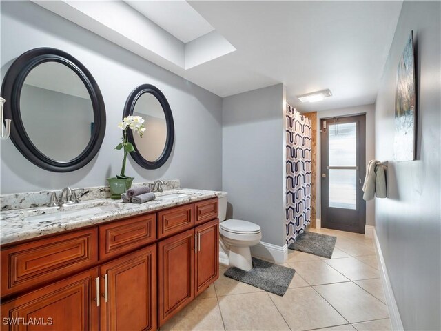 1431 SW 53rd Ln, Cape Coral, FL 33914 - bathroom featuring double vanity, tile patterned flooring, and a shower with shower curtain