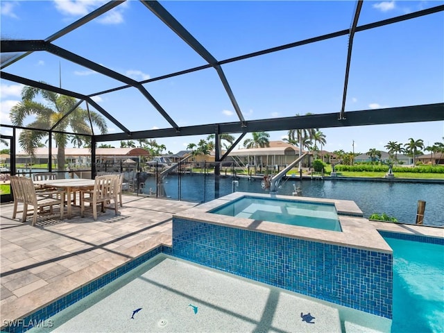 1431 SW 53rd Ln, Cape Coral, FL 33914 - outdoor pool featuring an in-ground hot tub, a water view, a patio, and a lanai